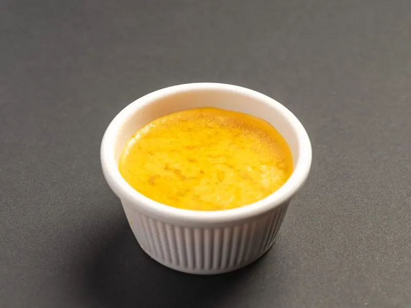 A pot of garlic butter dip