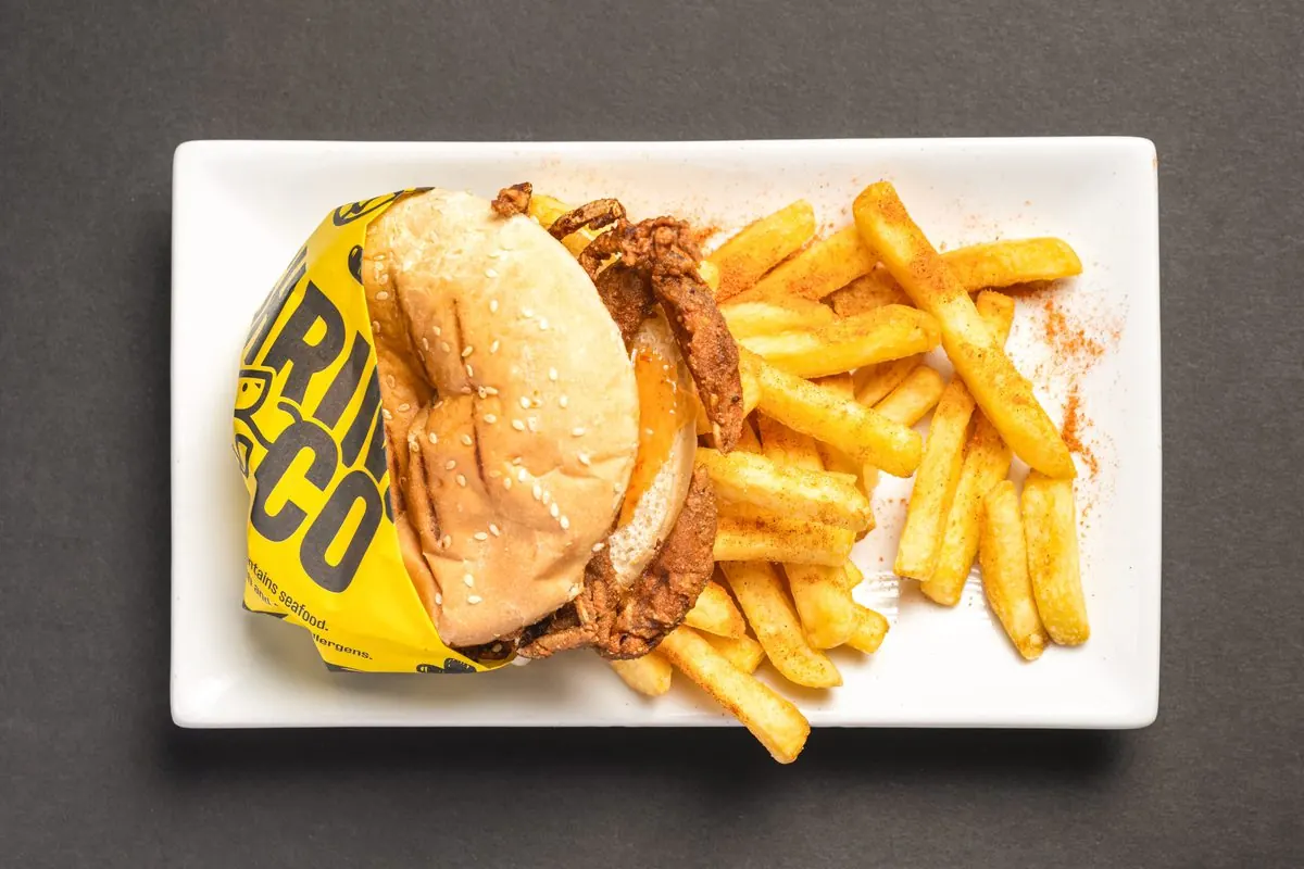 The Soft-Shell Crab Burger in a Shrimp & Co. wrapper with seasoned chips